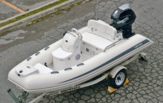GRAND golden line luxury fiberglass rigid inflatable boat tender on a trailer; 11’10” long, rated for 40HP engine max.