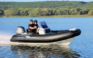 GRAND Golden line luxury rigid inflatable boat (RIB) tender; 13’9″ long, fiberglass hull, yamaha 70hp outboard motor, steering console, bow step plate.