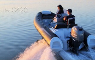 Back view GRAND golden line luxury rigid inflatable boat (RIB) tender in black, 13’9″ long.