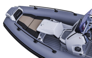 GRAND Goldenline G680 luxury RIB boat that is 22'3" long, rated for 200HP, passenger capacity of 12 persons. Bow and steering console storage close up view.